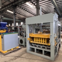 Machine de production de briques en béton QT4-15 pour blocs creux et pleins