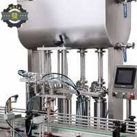 Machine de remplissage automatique multi-têtes pour liquides et pâtes, idéale pour jus, boissons, sauce tomate, cosmétiques