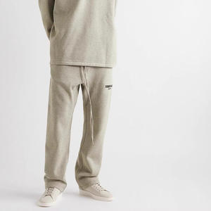 Essentials Sporthose in Hell- und Dunkel-Oatmeal mit Flockdruck, Stretch, Streetwear, anpassbarem LOGO, Unisex Herren Sweatpants - Product Image 2