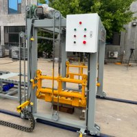 Empileur de blocs automatique Zhongke PLC compatible avec diverses machines de moulage de blocs entièrement automatiques.