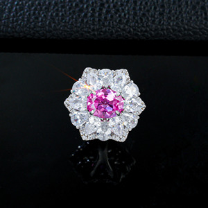 แหวนเงินแท้ 925 ประดับพลอยแซฟไฟร์พัพพารัดชาทรงรี ดีไซน์ลายดอกไม้ - Product Image 1