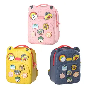Kids Cute Lightweight Silicone Backpack School Bag with 8pcs Cartoon Tags for 6-12Y Child EVA Unisex Women's Backpacks 1 Carton