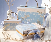 Boîte cadeau Saint Valentin Papier carton avec poignée Boîte d'emballage de parfum en carton rigide de luxe personnalisée