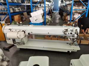 Machine à coudre industrielle à point droit à bras long à alimentation automatique supérieure et inférieure WD-0303L-56/85 Chine pour veste en duvet - Product Image 6