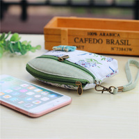 Porte-monnaie en coton à motif floral avec fermeture éclair, pochette à monnaie, portefeuille de poignet pour femmes