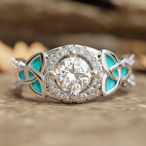 T0889 Anello di Fidanzamento da Donna in Argento 925 con Diamante Rotondo Brillante e Incastonatura a Griffe con Accenti in Turchese, Gioielleria Fine - Product Image 1