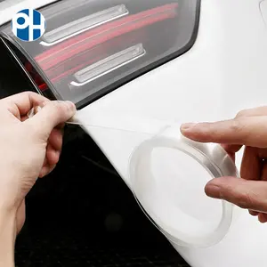 Autocollant <span class=keywords><strong>de</strong></span> protection <span class=keywords><strong>de</strong></span> <span class=keywords><strong>seuil</strong></span> <span class=keywords><strong>de</strong></span> <span class=keywords><strong>porte</strong></span> et <span class=keywords><strong>de</strong></span> pare-chocs <span class=keywords><strong>de</strong></span> voiture en PET transparent anti-collision avec adhésif haute adhérence - Product Image 1