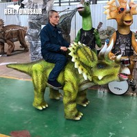 Machine de jeu électrique à monter sur un dinosaure animatronique