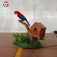 Perroquet animatronique réaliste grandeur nature, simulation d'ara avec mouvements et sons pour la décoration de parcs à thème, jardins et jungles