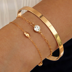 ชุดกำไลข้อมือสตรีสแตนเลสสตีลชุบทอง 18K ดีไซน์ทันสมัย ประดับลูกปัดแบบคิวบัน ดีไซน์ไม่สมมาตร แบบซ้อนชั้น - Product Image 5