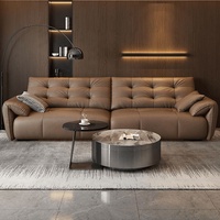 Ensemble de canapé modulaire en L en cuir pleine fleur pour salon, couleur Dune Mocha Biscuit, avec accoudoirs capitonnés et ottoman