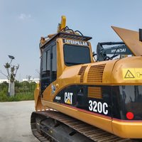 Excavatrice hydraulique d'occasion 320C, capacité de la benne de 0,8 m³, poids opérationnel de 21,1 tonnes, puissance de 110 kW, fonctionnement stable
