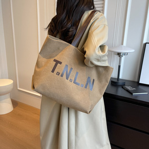 Sac fourre-tout rétro en toile grande capacité avec fermeture éclair en polyester pour femme, nouveau style coréen, tendance et polyvalent, à porter à l'épaule (Tanjing) - Product Image 4