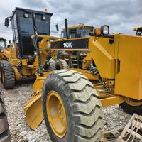 Prix avantageux, presque neuf, inspection complète disponible, vidéo disponible, accessoires complets, niveleuse Caterpillar 140K pour la construction routière