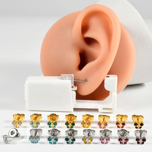 24 pz/scatola Dispositivo Monouso per Piercing Orecchio con Orecchino a Farfalla Placcato Oro 24K, Pistola per Piercing Monouso, Strumento all'Ingrosso - Product Image 1