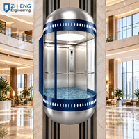 Ascenseur panoramique en verre rond avec construction en acier inoxydable, design moderne, durable et sûr pour usage domestique et commercial