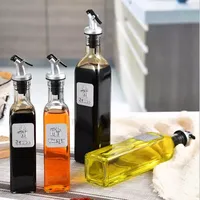 Meilleure vente 650ml 300ml haute qualité verre distributeur d'huile d'olive bouteille forme carrée liège étanchéité verre clair pour le stockage de l'huile