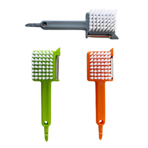 Herramientas de Cocina 3 en 1, molinillo de ajo de plástico, pelador de frutas y verduras con abridor de cepillos para un uso conveniente - Product Image 1