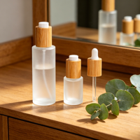 Flacon cosmétique en verre givré écologique avec compte-gouttes à pression en bambou pour sérum et huile pour le visage