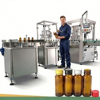 Machine de remplissage automatique de bouteilles de liquide par pulvérisation de haute précision 10 ml-50 ml pour ligne de remplissage de boissons, produits chimiques et sirops