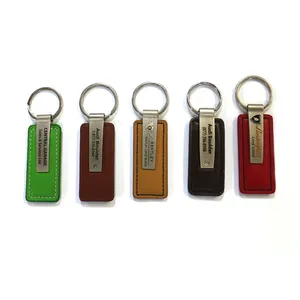Porte-clés personnalisé en cuir véritable gaufré avec Logo, blanc, pour voiture, cadeau de mariage, vente en gros, pièces