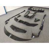 Kit carrosserie style OEM en fibre de carbone sèche : lames avant et arrière, jupes latérales, couvre-aileron arrière, etc. pour Lamborghini Revuelto