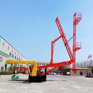 Plateforme élévatrice sur chenilles HUAYING 12,5 m de hauteur de levage maximale, capacité de charge 0,6 T, panier de travail pour l'installation de panneaux muraux - Product Image 1