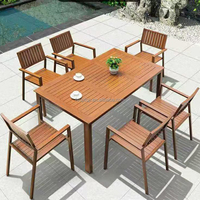 Ensemble table et chaises de patio extérieur UPTOP en plastique imitation bois, résistant à l'eau, aux taches et aux insectes