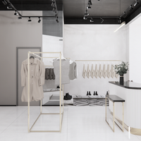 Étagère de présentation de vêtements en bois moderne et personnalisée pour les boutiques de vêtements