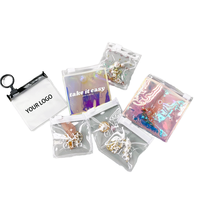 Sac refermable en PVC aseptique de luxe élégant avec fermeture éclair métallique holographique pour bijoux, bracelets, lunettes, bagues, boucles d'oreilles, colliers, pierres précieuses