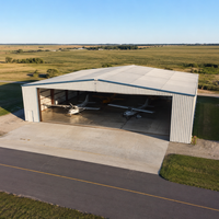 Hangar d'avion préfabriqué en structure acier sur mesure, bâtiment métallique PEB à portée libre pour MRO et jets privés