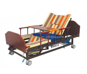 Letto di ospedale manuale con testa e coda in legno massello con torcia elettrica a foro vasino centrale Design medico-realizzato in ABS - Product Image 1