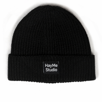 Bonnet tricoté uni streetwear hiver en promotion avec étiquette tissée personnalisée