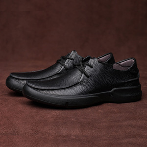Chaussures de marche pour hommes en cuir véritable à bout rond, à lacets, respirantes, avec semelle extérieure en caoutchouc, couleur unie, style décontracté - Product Image 1
