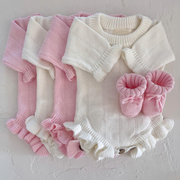 Personnalisé haut de gamme 100% coton biologique manches longues tricots pour bébés combinaisons barboteuse barboteuse en coton tricoté bébé fille barboteuse à volants