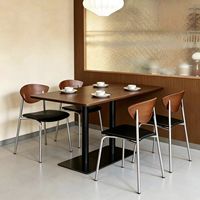 Meubles de salle à manger commerciaux minimalistes du milieu du siècle, table de bistrot élégante et chaise à dossier incurvé pour café