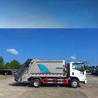 Camion compacteur de déchets ISUZU Blue Dongfeng 8m³ 1000kg Extensions 2800/3300 L Résidentiel Rotatif pour eau chaude et gouttières