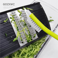 Nettoyeur de couverts double tête à prix d'usine, grattoir vert, brosses de nettoyage de cuisine, emballées individuellement, 2 couleurs