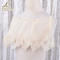 Bordure en dentelle florale brodée papillon sur filet transparent ivoire, personnalisable en gros, pour vêtements et fournitures de couture DIY