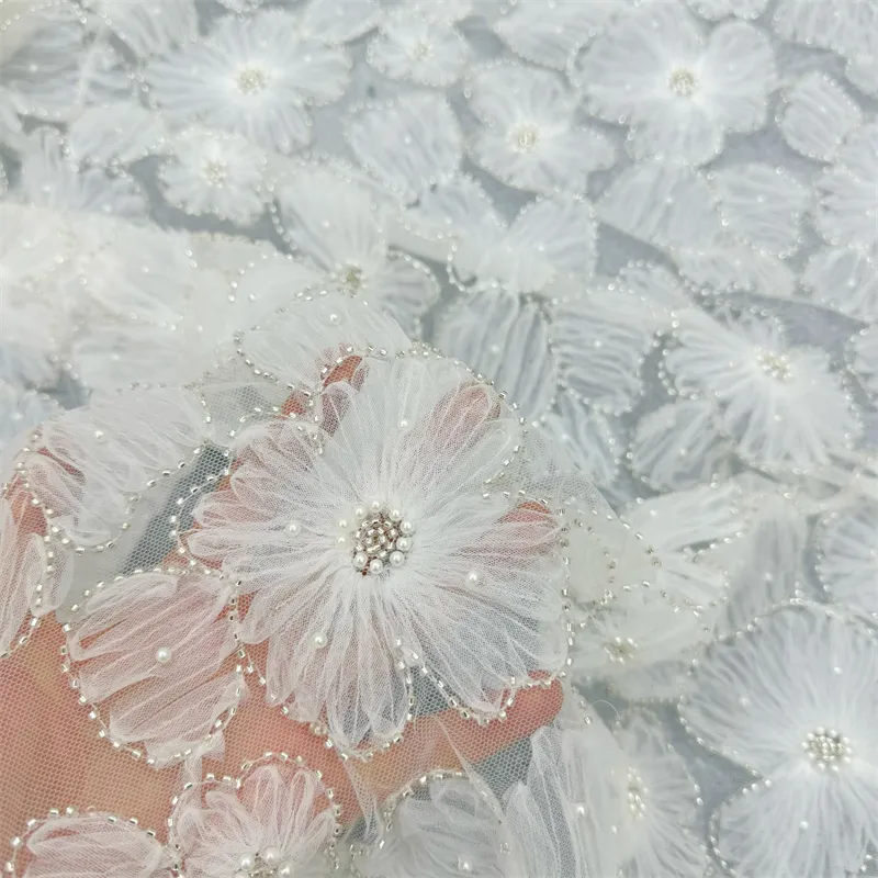 China Wholesale Price White Flower 3D Pearl Fabric Mesh Lace Beads Sequin Fabric For Wedding Dress