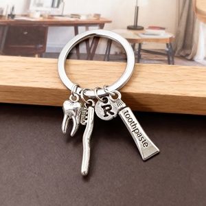 Customized Blank Dental Pliers <b>Metal</b> Souvenir Ring 26 Letter Set Toothbrush Toothpaste Key Chain Business Gift - Product Image 1
