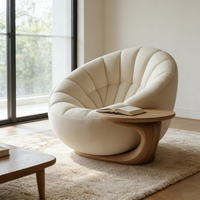 Fauteuils pivotants contemporains ronds et confortables, canapé design unique en forme de pétale avec table d'appoint intégrée, mobilier de réception pour hall d'hôtel