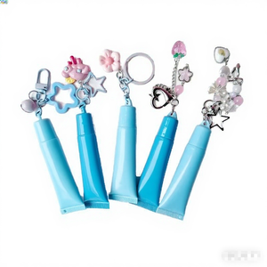 หลอดลิปกลอสพลาสติกสีชมพูขนาด 15 มล. สำหรับบรรจุภัณฑ์เครื่องสำอางแบบหลอดพร้อมสายคล้องลูกปัดสำหรับงานสกรีน - Product Image 1