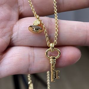 Collier et bracelet Saturne Younis Key style punk Empress Dowager, simple, planète tridimensionnelle, chaîne en alliage de bambou, unisexe - Product Image 1