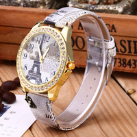 Montre analogique à quartz pour femme, style vintage, tour Eiffel de Paris, avec fleur, boîtier en alliage, verre en cristal et bracelet en cuir