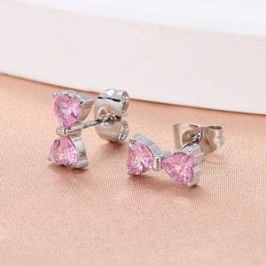 Boucles d'oreilles tendance en acier titane avec nœud étoile et zircon, forme fleur, style luxe léger et simple, pour soirée, vente en gros - Product Image 4