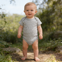 T-shirt à manches courtes populaire et confortable pour enfants avec boutons-pression pour un usage quotidien des nourrissons