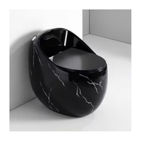 Nouveau design en forme d'œuf, vente chaude, WC en marbre noir, toilette monobloc en céramique à poser au sol pour salle de bain, cuvette ronde