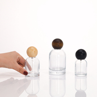 Sortie d'usine bouteille de parfum de cylindre en verre vide 50ml pompe pulvérisateur clair emballage Transparent approvisionnement ponctuel
