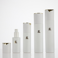 Flacons pompe cosmétiques en verre blanc premium 30ml 50ml 100ml 120ml avec couvercle ondulé doré